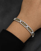 Male model wearing 18K Knot Diamond Bracelet