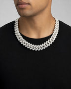 Male model wearing 14K 15MM Jumbo Iced Razor Cuban Link Chain 16"