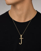 Male model wearing 10K Cursive J Initial Diamond Pendant
