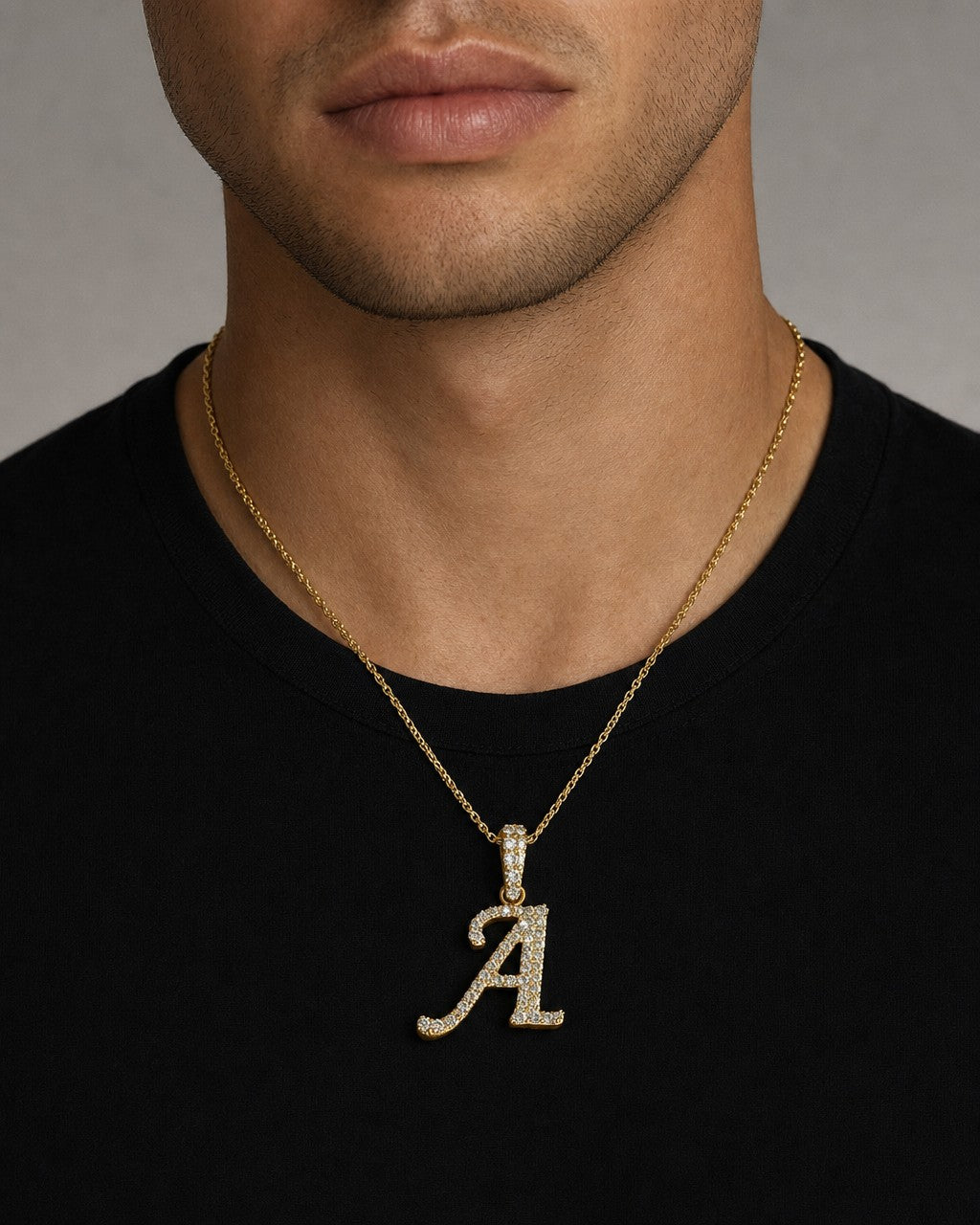 Male model wearing 10K Cursive A Initial Diamond Pendant