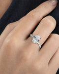 Female model wearing Custom 18K Luxe Joy Oval Diamond Engagement Ring