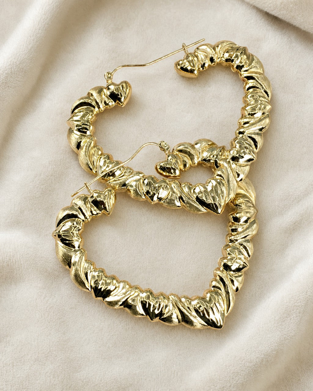 10K Puff Heart Shape Hoop Earrings styled photo
