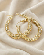 10K Circle Puff Heart Hoop Earrings styled photo