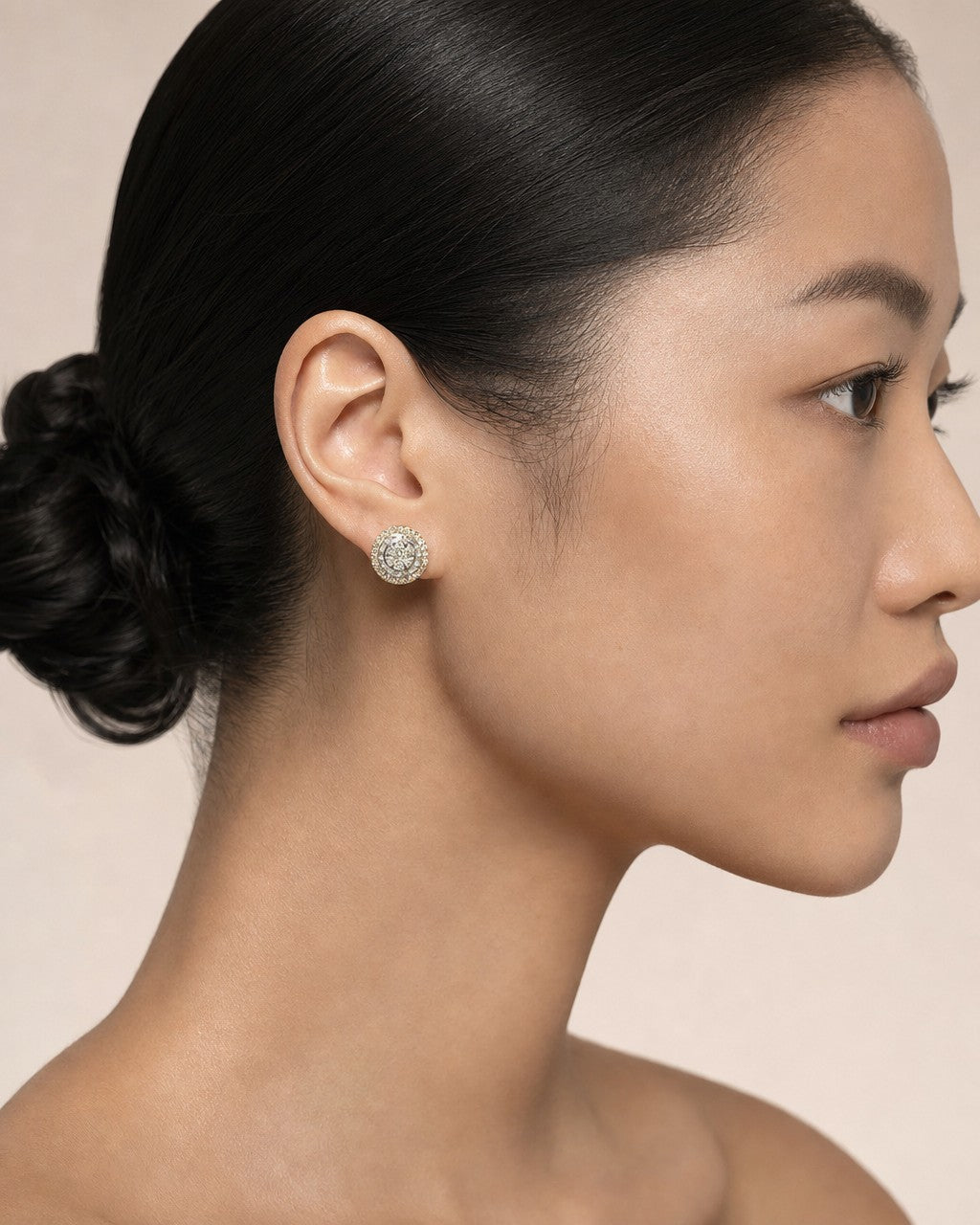 Female model wearing 14K Jumbo Halo Bloom Diamond Baguette Earrings
