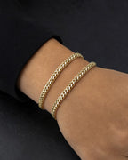Male model wearing 14K Box Cuban Link Bracelet