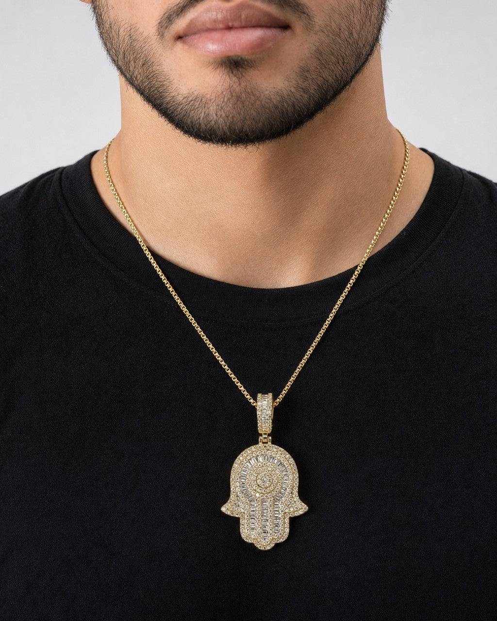 Male model wearing 14K Hamsa Diamond Pendant