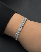 Male model wearing 14K Rounded Rectangle Link Diamond Baguette Bracelet 7mm