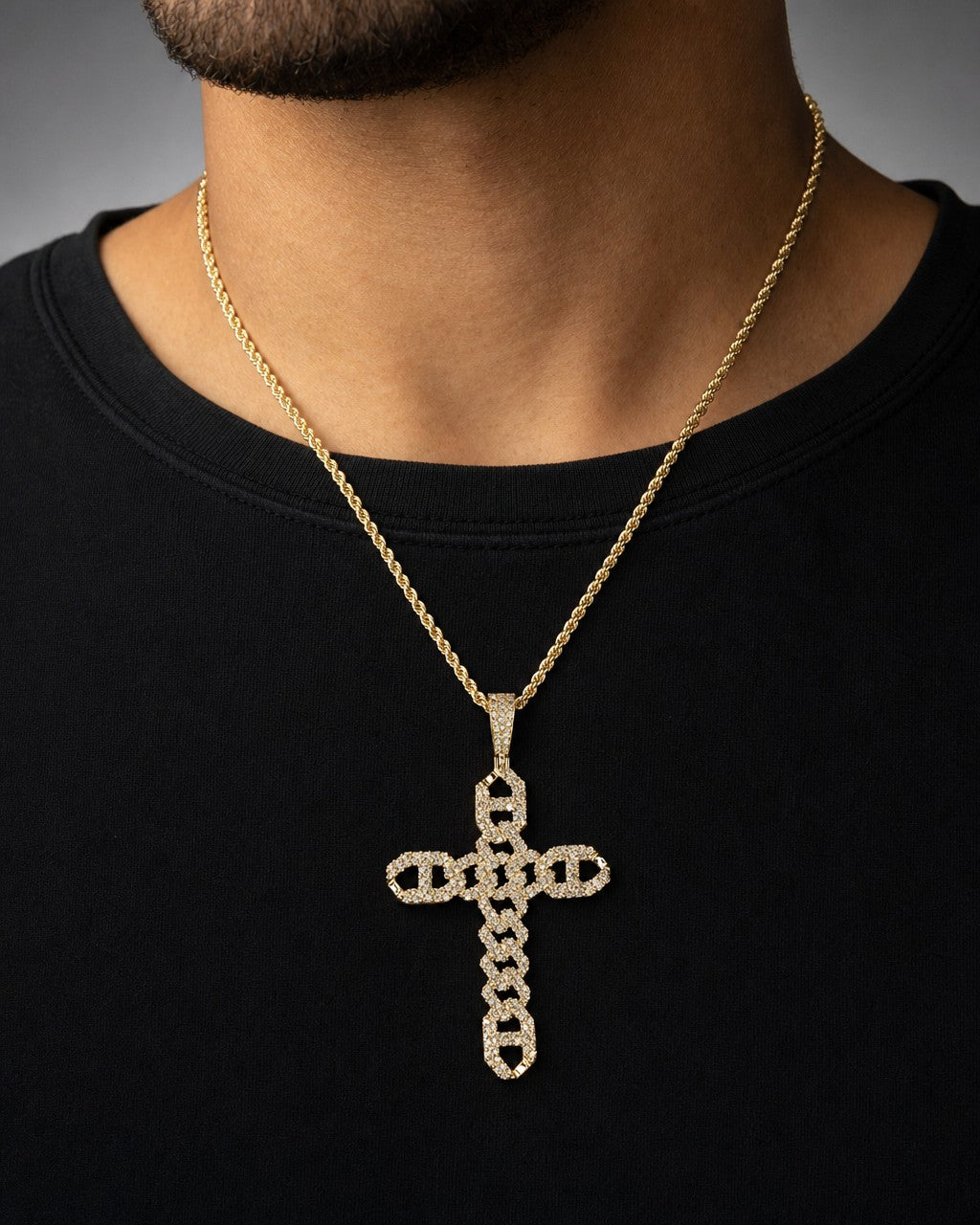 Male model wearing 14K Cuban Link Cross Diamond Pendant