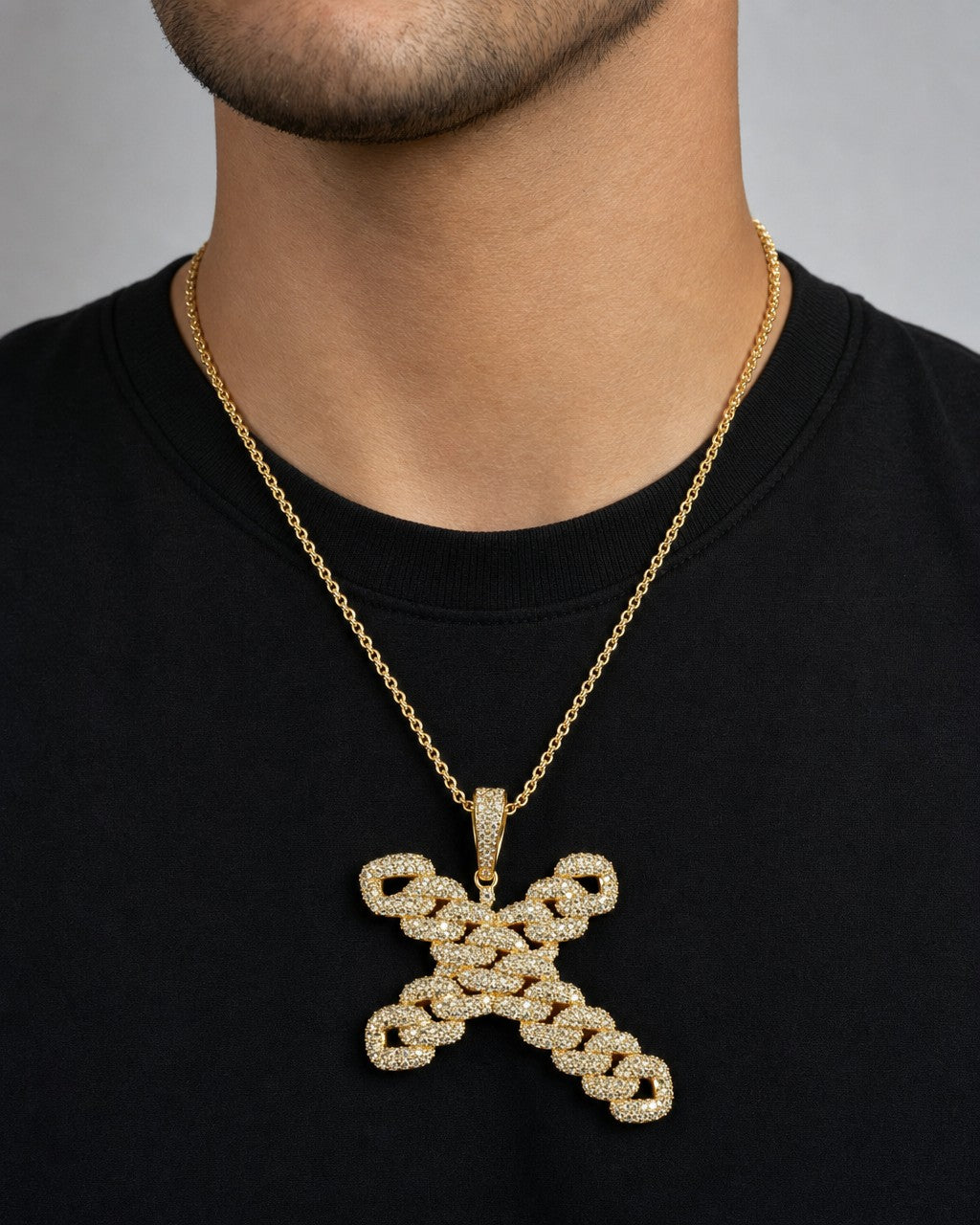 Male model wearing 14K Jumbo Cuban Cross Pendant