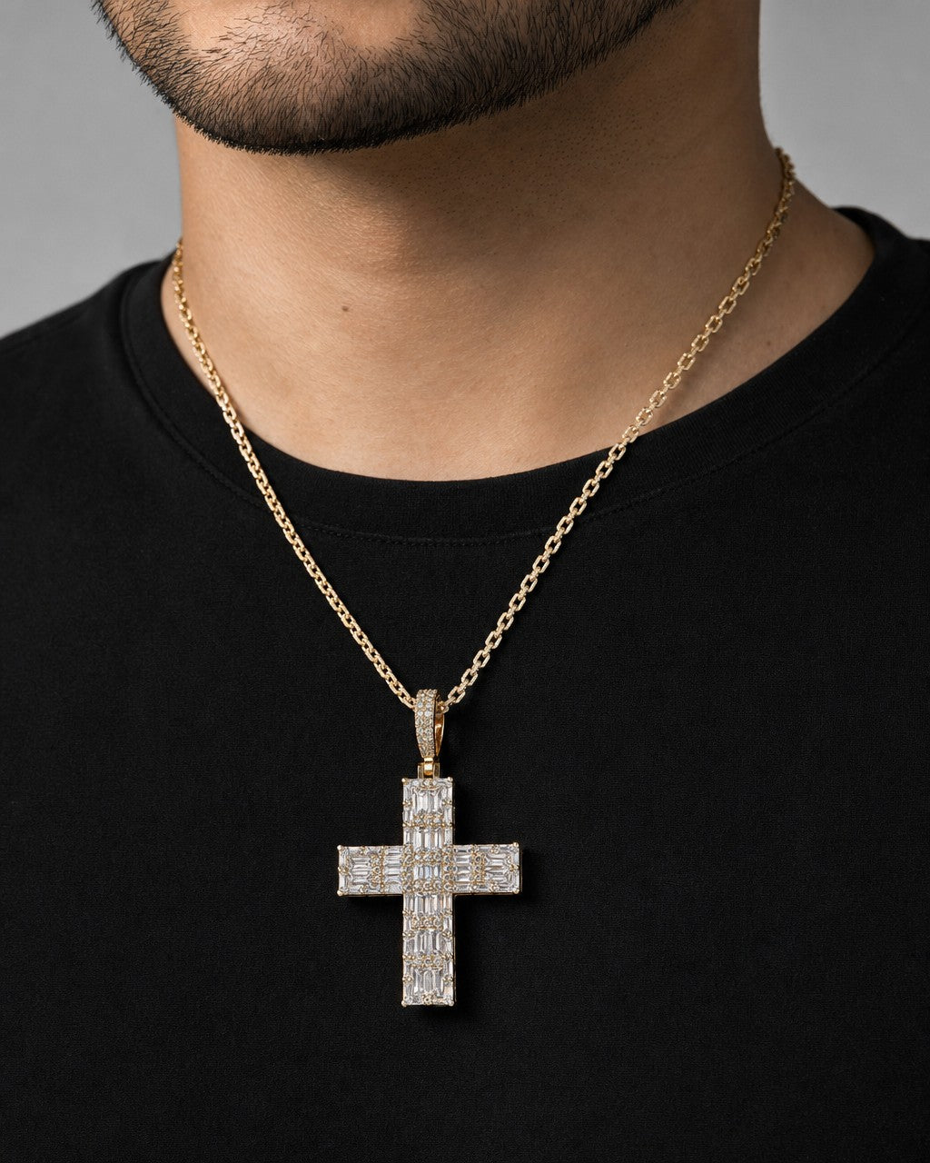 Male model wearing 10K Cross 3D Baguette Diamond Pendant