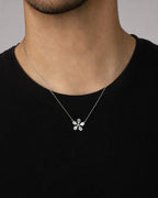 Male model wearing 14K Daisy Flower Diamond Baguette Necklace
