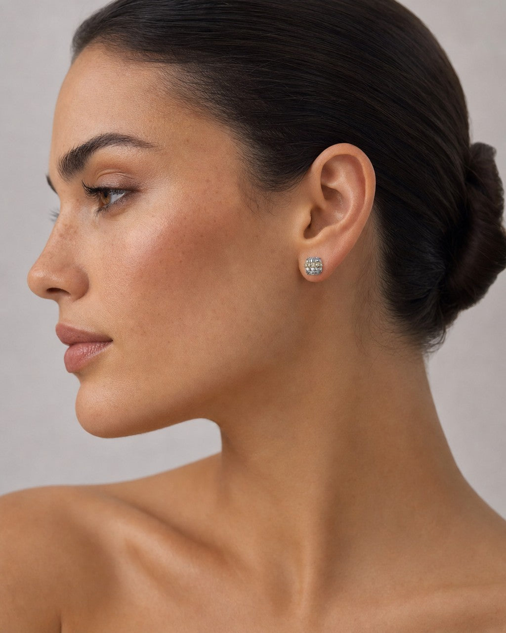 Female model wearing 14K Square Diamond Baguette Row Earrings