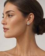 Female model wearing 14K Circle Stacked Diamond Baguette Earrings