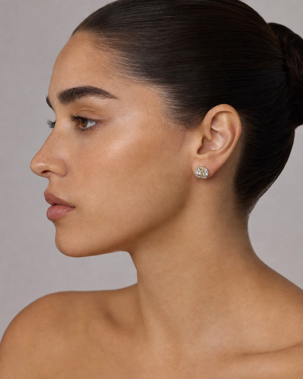 Female model wearing 14K Circle Diamond Baguette Earrings