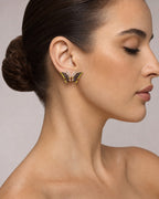 Female model wearing 14K Medium Butterfly Diamond Earrings