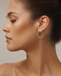 Female model wearing Bamboo Earrings 0.8”