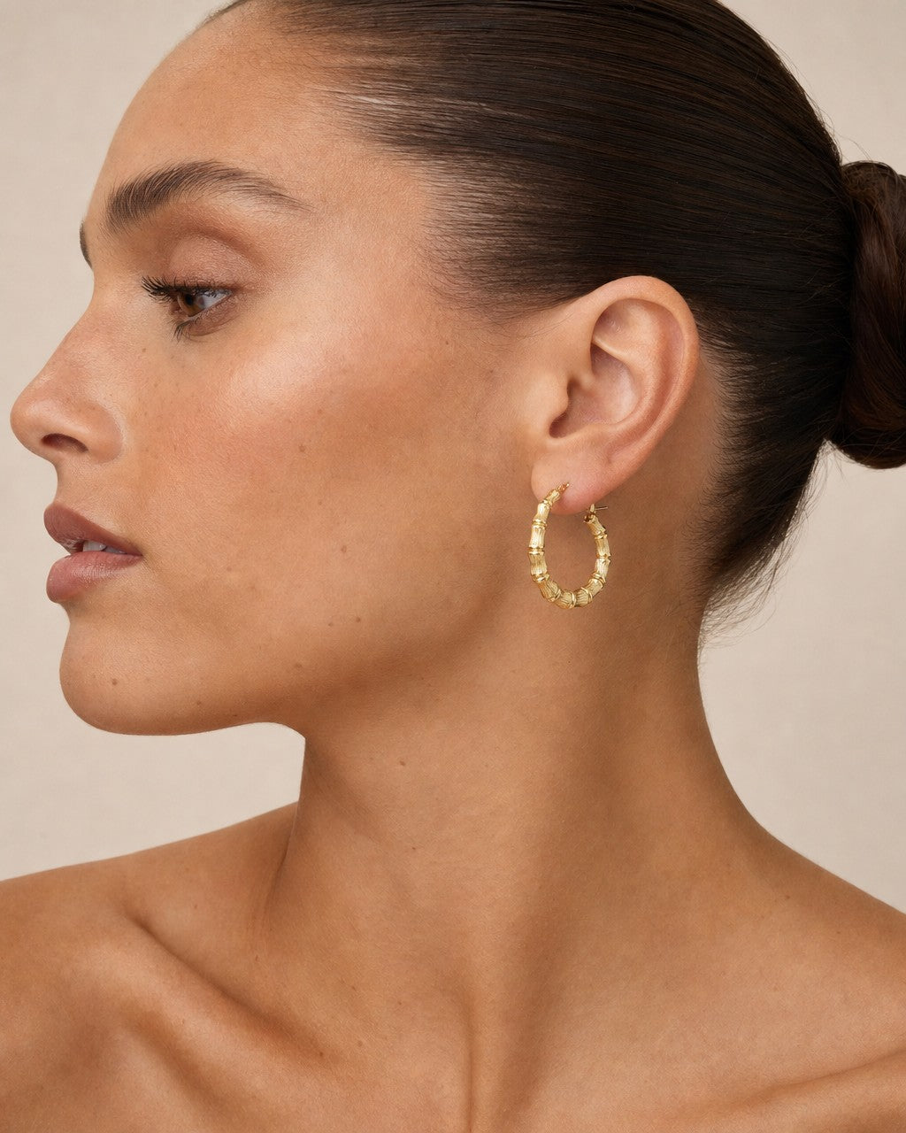 Female model wearing Bamboo Earrings 1.5”