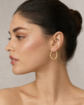Female model wearing Bamboo Earrings 1.8”