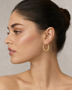Female model wearing Bamboo Earrings 1.8”