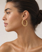 Female model wearing Bamboo Earrings 2.3”