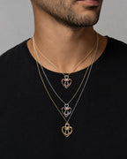 Male model wearing 10K Gold and Diamond Heart Necklace