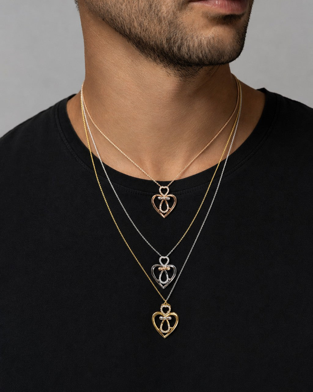 Male model wearing 10K Gold and Diamond Heart Necklace
