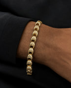 Male model wearing 14K 6MM Round Link Bracelet 7.5"
