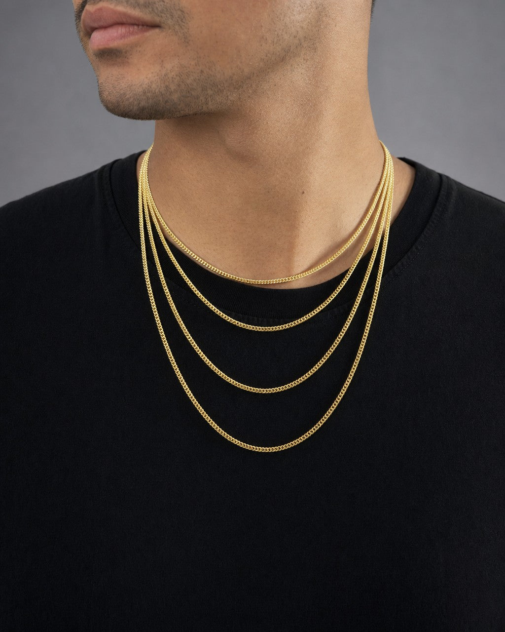 Male model wearing 10K 1.5MM Franco Link Chain 16-22"