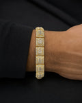 Male model wearing 10K 10MM Square Diamond Baguette Bracelet 8.5"