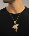 Male model wearing 14K Flying Shark Diamond Pendant