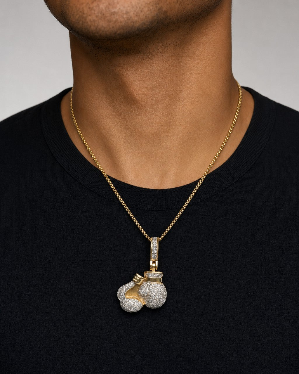 Male model wearing 14K Boxing Gloves Diamond Pendant