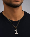 Male model wearing 14k Number 1 Diamond Pendant
