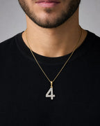 Male model wearing 14k Number 4 Diamond Pendant