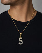 Male model wearing 14k Number 5 Diamond Pendant