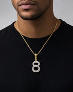 Male model wearing 14k Number 8 Diamond Pendant