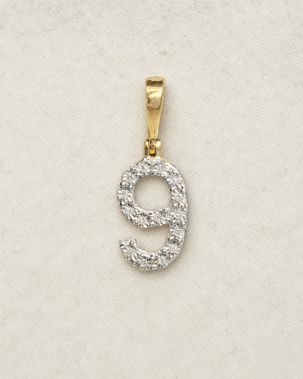 14k Number 9 Diamond Pendant styled photo