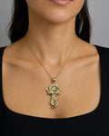 Female model wearing 14K Baby Jesus Pendant 1.2"