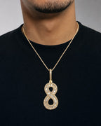 Male model wearing 14k Number 8 Diamond Baguette Pendant
