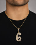 Male model wearing 14K Number 6 Diamond Baguette Pendant