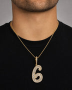 Male model wearing 14K Number 6 Diamond Baguette Pendant