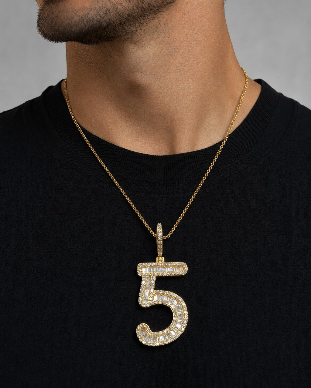 Male model wearing 14k Number 5 Diamond Baguette Pendant