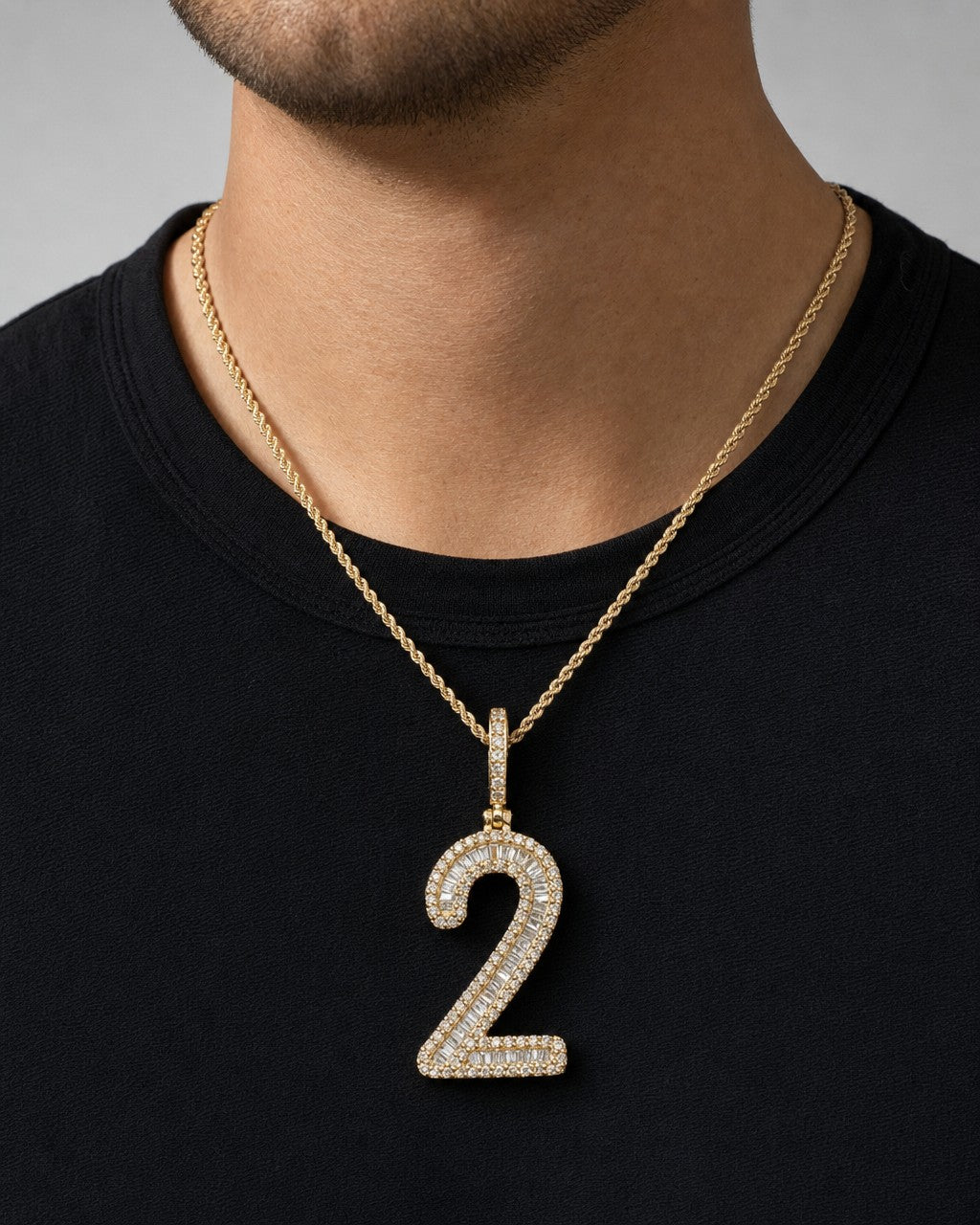 Male model wearing 14k Number 2 Diamond Baguette Pendant