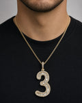 Male model wearing 14k Number 3 Diamond Baguette Pendant