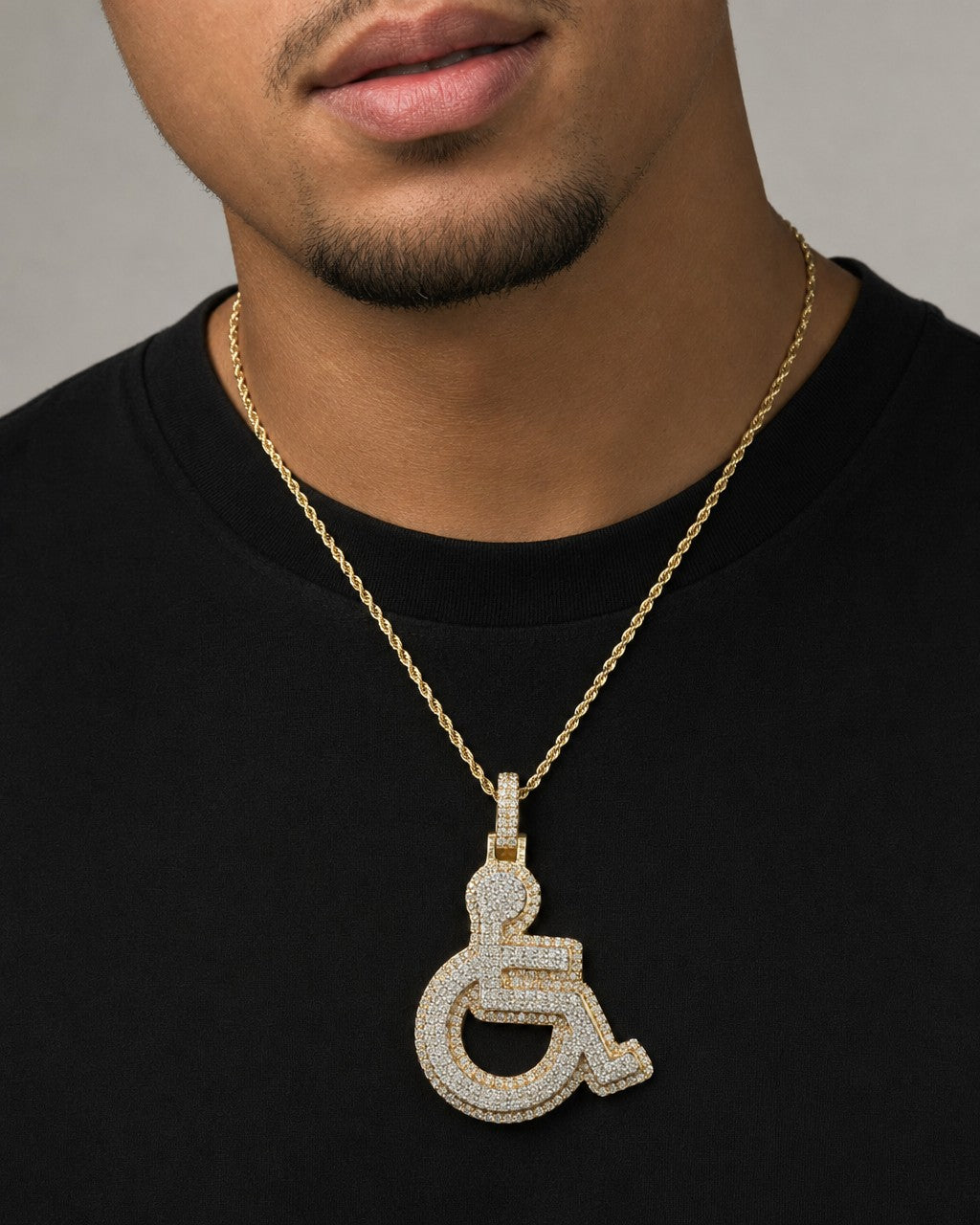 Male model wearing 14K Handicap Wheelchair Diamond Pendant
