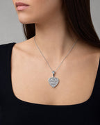 Female model wearing 14K Heart Diamond Baguette Pendant
