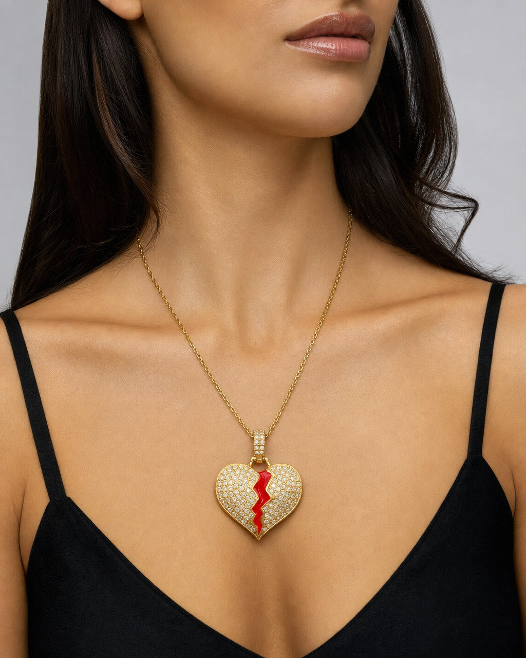 Female model wearing 14K Bleeding Heart Diamond Pendant