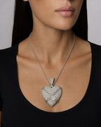 Female model wearing 14K Chained Heart Diamond Pendant