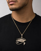 Male model wearing 14K Eygptian Eye of Horus Diamond Pendant