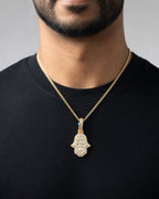 Male model wearing 14K Small Hamsa Diamond Baguette Pendant