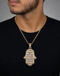 Male model wearing 14K Hamsa Diamond Baguette Pendant